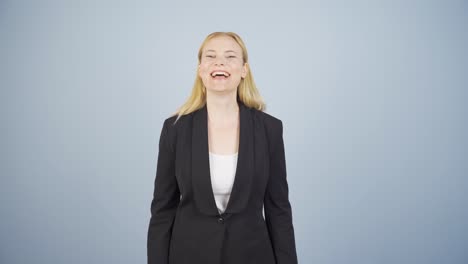 Business-woman-laughing-at-camera.